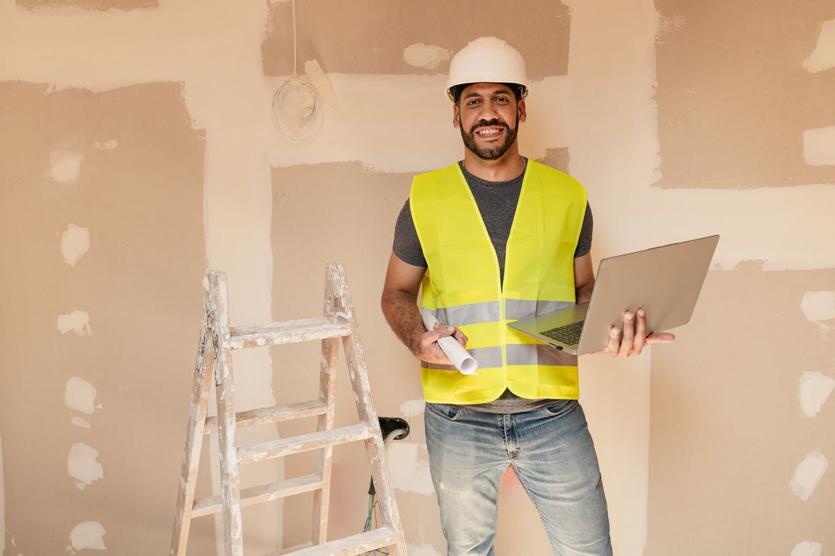 Property manager reviewing plans at a building